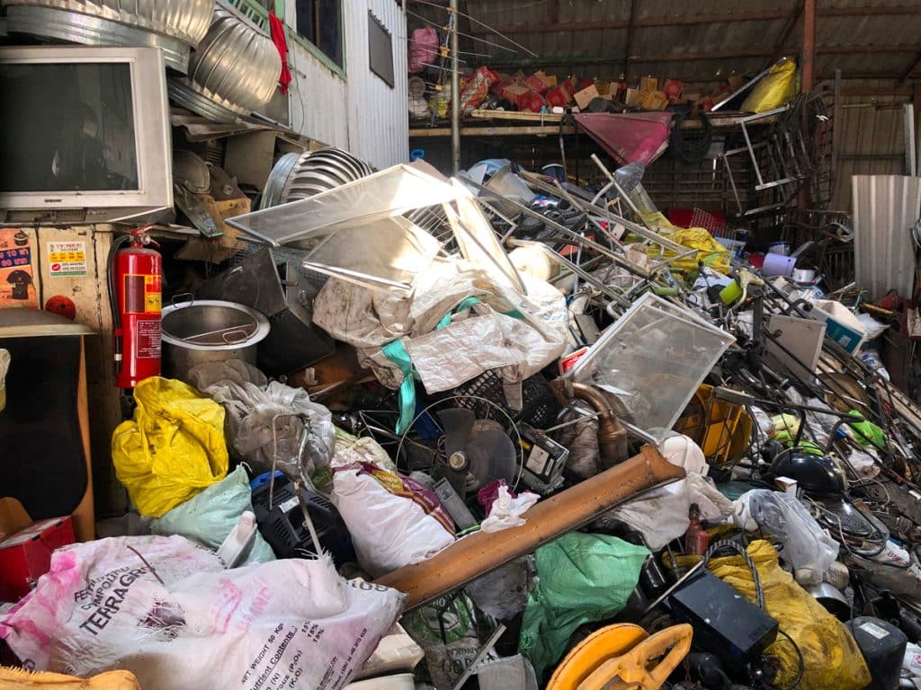 Commercial building filled with debris and trash