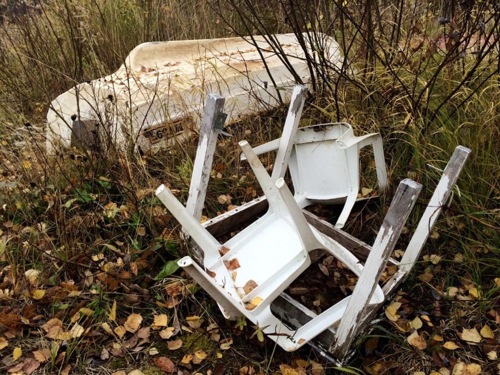 Old Patio Furniture And Boat